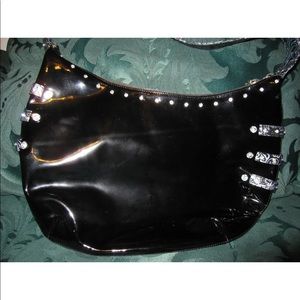 Charm and luck crossbody handbag